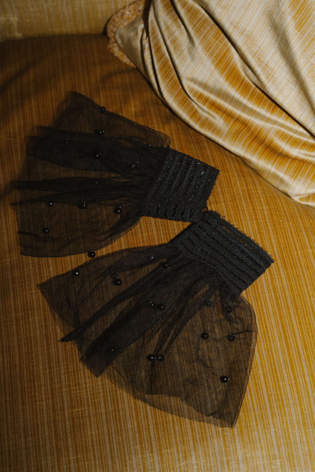 Mouwtje parels - Zwart